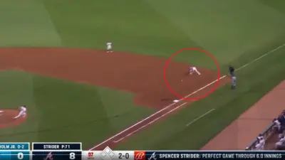 Matt Olson fields a ball