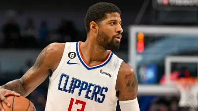 Paul George dribbling the ball