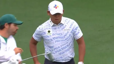 Si Woo Kim in a PGA Tour shirt