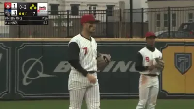 The Rocket City Trash Pandas standing on the field