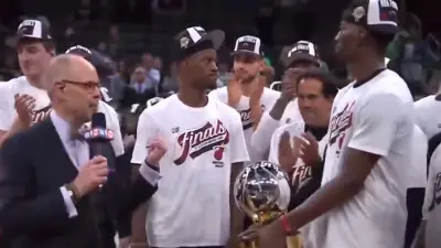 Jimmy Butler refuses to hold the Eastern Conference trophy