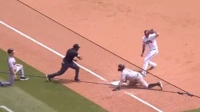Ronald Acuna Jr throws a runner out from right field
