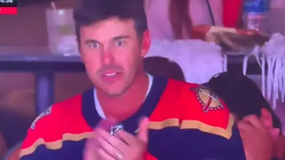 Brooks Koepka cheering for the Panthers