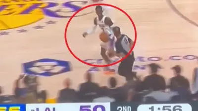 Dennis Schroder dribbling the ball