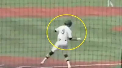 Drake Siens flipping his bat