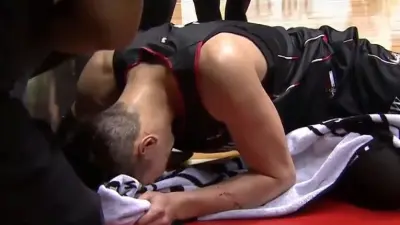 Jeremy Lin lying on the ground in pain