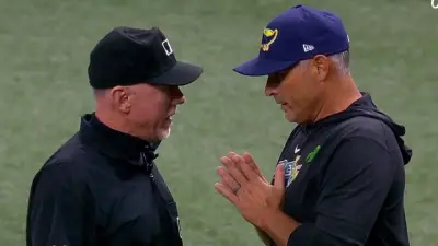 Kevin Cash talks with an umpire