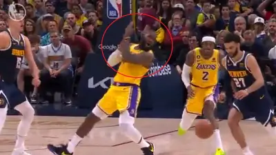 LeBron James grabs his hand
