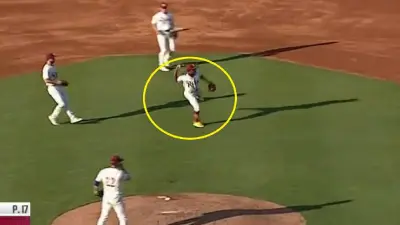 Luisangel Acuna making a throw