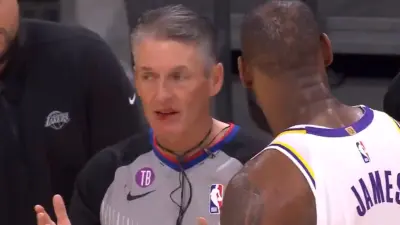LeBron James talks with Scott Foster