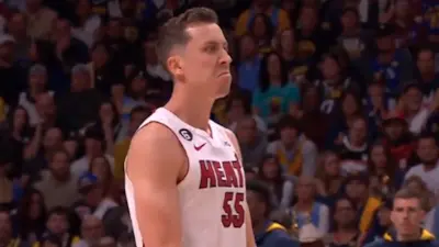 Duncan Robinson mean mugs after a shot