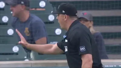 Umpire Lance Barrett issues a warning