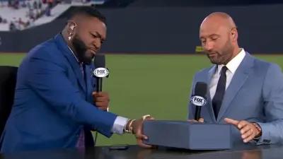 David Ortiz hands Derek Jeter a box