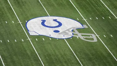 The Indianapolis Colts logo on the field