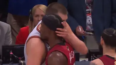 Nikola Jokic shaking hands with Jimmy Butler