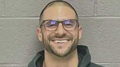 DJ Hernandez poses for a mug shot