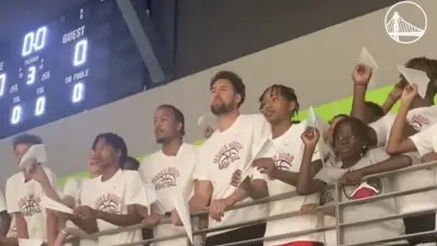Warriors star Klay Thompson throwing paper airplanes with campers