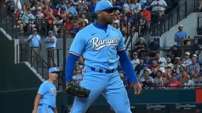 Aroldis Chapman poses after a pitch
