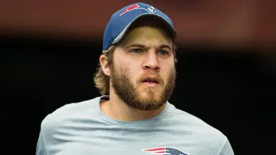 Brian Belichick in a Patriots hat