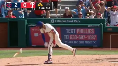 Alec Bohm throws his bat in frustration