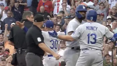 Dodgers' Max Muncy and manager Dave Roberts protest call against umpire Jordan Baker