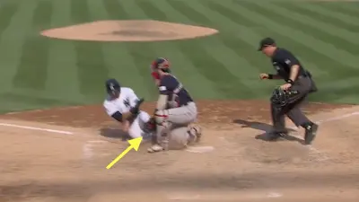 Yankees baserunner Isiah Kiner-Falefa sliding into home plate