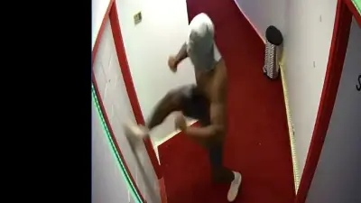 Arik Gilbert tries to kick a door