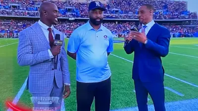 Darrelle Revis in a polo shirt