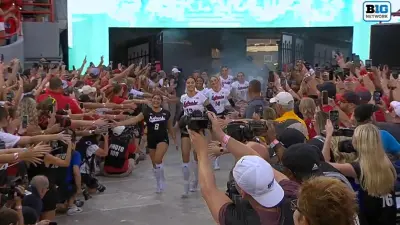 Nebraska volleyball players greeted by fans