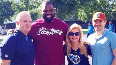 The Tuohy family with Michael Oher