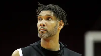 Tim Duncan looking on