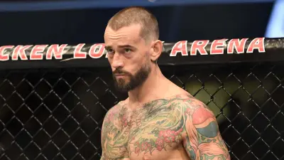 CM Punk looking on