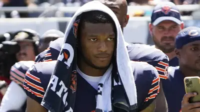 DJ Moore stands with a towel over his head
