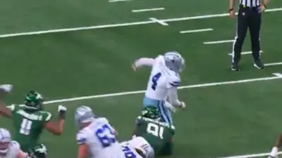 Dak Prescott takes a low hit