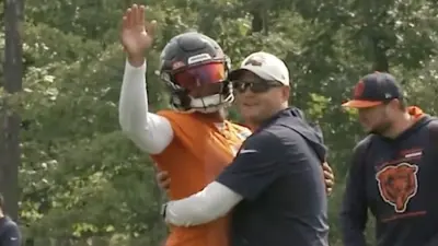 Justin Fields hugs Luke Getsy