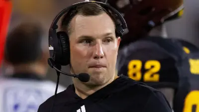 Kenny Dillingham with a headset