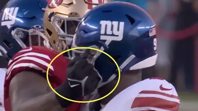Trent Williams punches a Giants player
