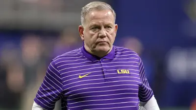 Brian Kelly in an LSU shirt