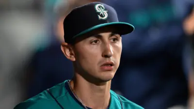 George Kirby in the dugout