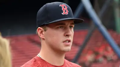 Kyle Teel in a Red Sox hat
