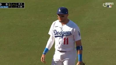 Miguel Rojas standing on the field