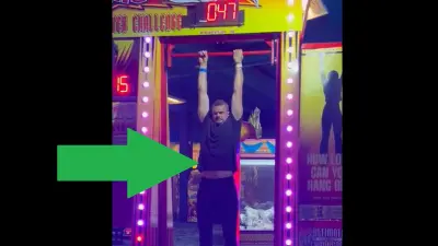 Thomas Morstead hangs from a bar