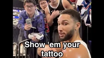 Ben Simmons with a Nets fan who had a Simmons tattoo on his chest