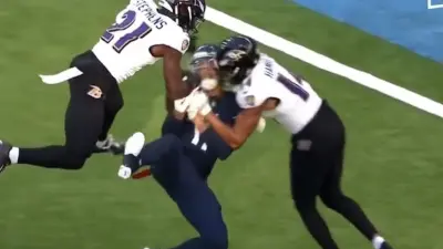 Kyle Hamilton hits Chris Moore in the head