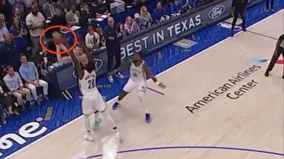Luka Doncic sinks a game-winning hook shot during a Mavs-Nets game