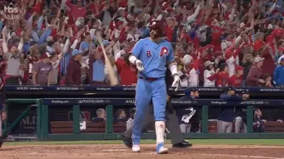 Nick Castellanos celebrating a home run during Phillies-Braves NLDS Game 4