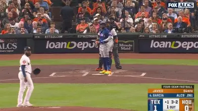 Adolis Garcia admires his hit