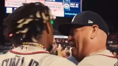 Brian Snitker talks to Ronald Acuna Jr