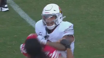 James Conner shovig Talanoa Hufanga