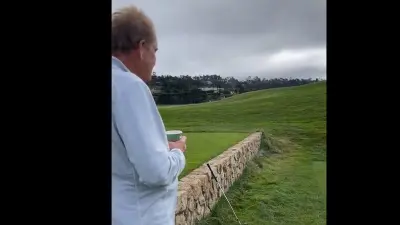 Jim Nantz looking at a course